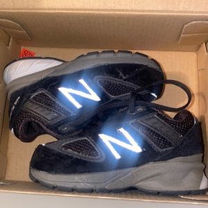 All black baby sneakers